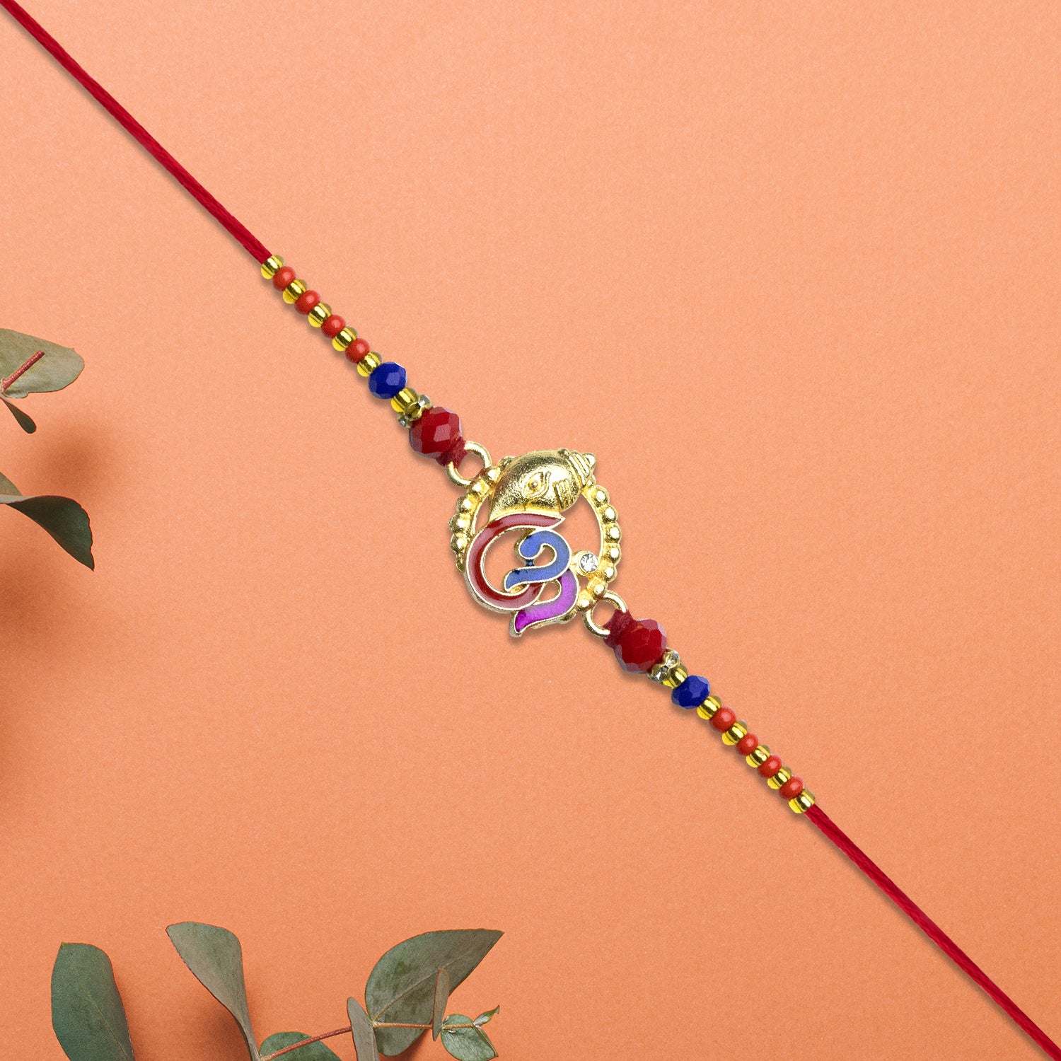 Ganesh Rakhi With Vibrant Enamel Work Ganesh Rakhi With Vibrant Enamel Work